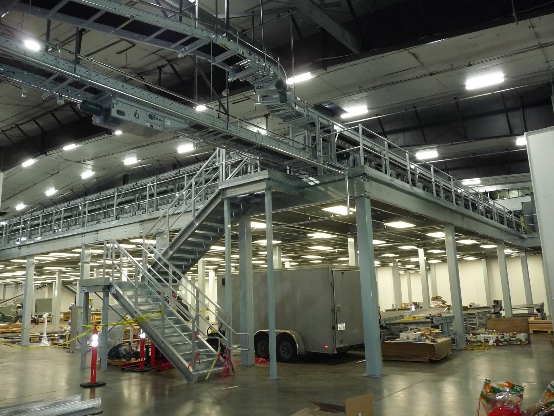 Large warehouse mezzanine platform with stairs installed by Source 4