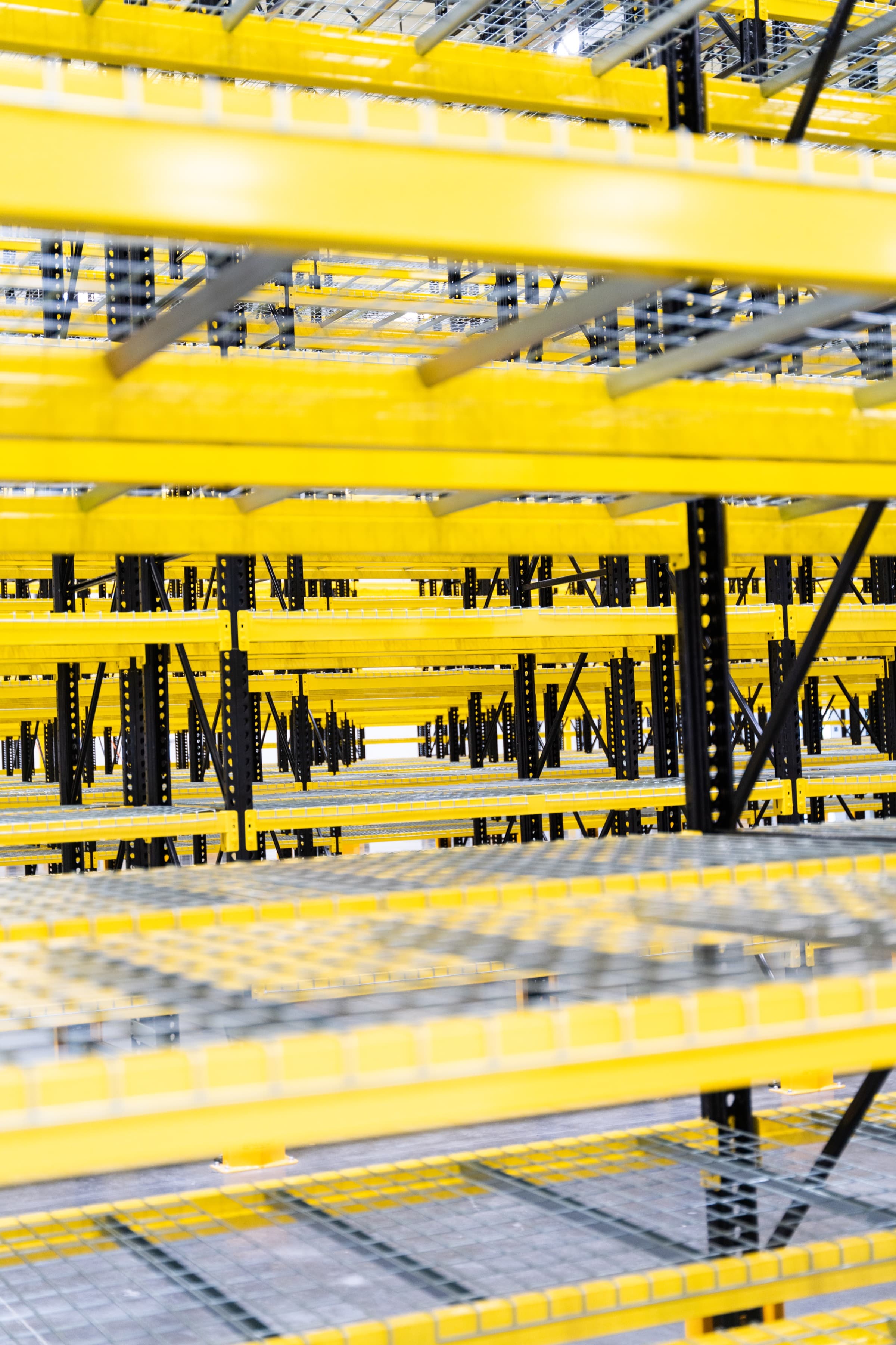 Wire decking detail inside a push-back rack system